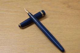 A boxed Conway 57 aero fill fountain pen (needs sac) in blue with broad cap band with chain decal