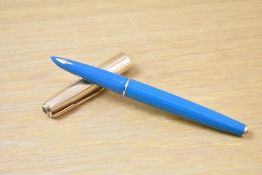 A Parker Custom Insignia capillary fill fountain pen in turquiose with rolled gold cap