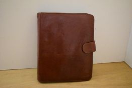 A boxed Texier Personal Management System Workbook Organiser in brown leather 24 x 19cm