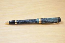 A Parker Centennial ballpoint pen in green marble.