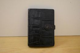 A Mulberry Black Conga leather organiser/ agenda, which includes a calculator/ measure 10.5x15cm