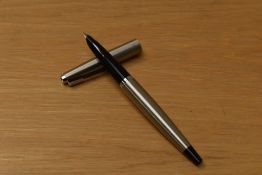 A Parker 45 Deluxe Flighter CT cartridge fill fountain pen with black tassie.