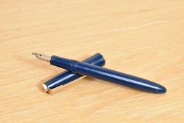 A Parker Slimfold aerometric fill fountain pen in blue having a Parker 14K 585 England 5 nib