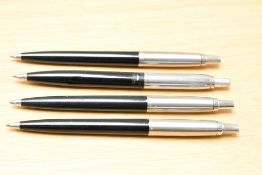 Four Parker Jotter ballpoint pens in black