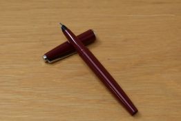 A Parker Slimfold cartridge converter fountain pen in red bearing original chalk mark