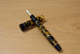 A Presentation boxed Conway Stewart Churchill lever fill fountain pen in honey noire with hallmarked