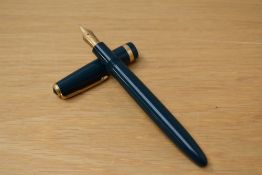 A Parker Duofold Maxima aerometric fill fountain pen in green with broad Duofold cap band having 14K