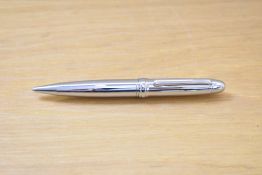 A L'Plume ballpoint pens in chrome.