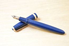 A Parker Duofold aerometric fill fountain pen in dark blue with Duofold broad cap band having Parker