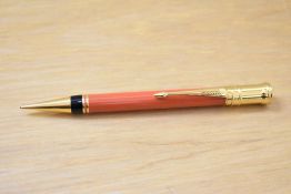 A Parker Centennial MKII propelling pencil in orange.