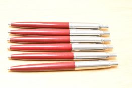 Six Parker Jotter ballpoint pens in burgundy