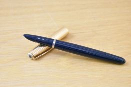 A Parker 51 aerometric fill fountain pen in dark blue with rolled gold cap