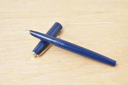 A Parker 45 TX cartridge fill fountain pen in dark blue. Cap band missing
