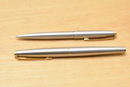 A Parker 45 Deluxe Flighter ballpoint pen and propelling pencil set. Very small dent to ballpoint