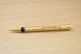 A Parker Centennial MKII propelling pencil in godron gold.