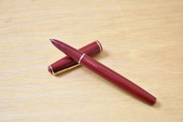 A Parker 17 Lady aerometric fill fountain pen in red with gold trim
