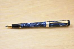 A Parker Centennial ballpoint pen in blue marble.