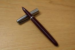 A boxed Parker 51 aeromatic fill fountain pen in burgundy with lustraloy cap.