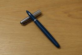 A boxed Parker 51 aeromatic fill fountain pen in teal with lustraloy cap.