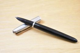 A Parker 51 plunger fill fountain pen in black with lustraloy cap with gold trim