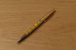 A Parker Jotter 50th Anniversary edition ballpoint pen in saffron yellow with silver filigree and
