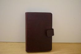 A boxed Lefax organiser in red leather 19 x 14cm