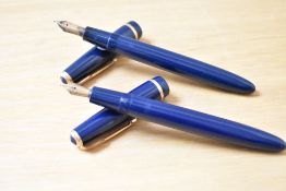Two Parker Senior Duofold aerometric fill fountain pens in blue with Duofold cap band one having