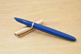 A Parker 51 aerometric fill fountain pen in teal with rolled gold cap