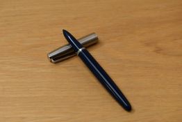 A Parker 21 aerometric fill fountain pen in dark blue with lustraloy cap
