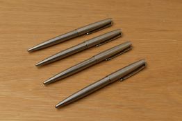 Four Parker 45 Flighter ballpoint pens