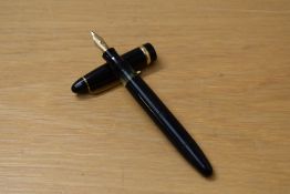 A Soennecken 333 Extra piston fill fountain pen in black having a 14k 585 Soennecken nib