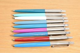 Nine Parker Jotter ballpoint pens in various colours (one engraved having a converter from LSD to
