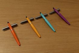 Four Parker 45 classic converter fill fountain pens in baby blue, purple, yellow and orange all with