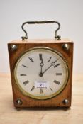 An early 20th Century ABEC mantel clock clock, the square oak case with a swing brass handle,