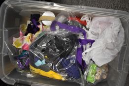 An assortment of crafting equipment and materials including felt and ribbons etc.