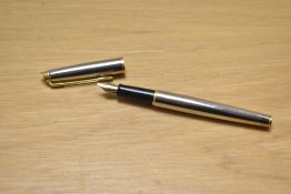 A Waterman Hemisphere converter fill fountain pen in chrome with gilt trim having Waterman Paris M