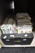 An assortment of vintage sewing patterns/templates, ranging from 1950s onwards, most seem to be