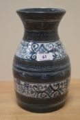 A mid-20th Century French Quimper ware vase, hand painted with a banded design by Jean-Pierre