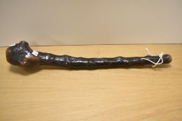 A vintage hardwood club, measures 50cm.
