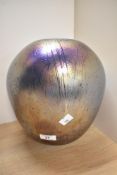 A large John Ditchfield iridescent petroleum glass vase, of ovoid form and having a naturalistic