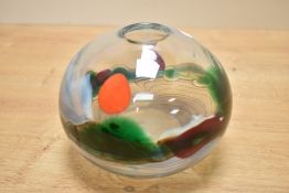 A John Ditchfield clear art glass vase, of spherical form with a trailed design featuring a band