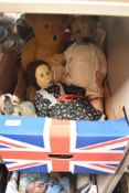 A mid 20th century straw filled yellow plush Teddy Bear having plastic eyes, stitched nose and