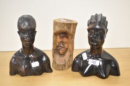 A 20th Century folk art style drift wood facial carving, measuring 18cm high, and two African