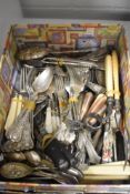 A large selection of silver plated cutlery and flatware comprising knifes, forks and desert spoons