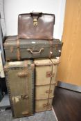 An early 20th Century brown leather attache case, measuring 42cm long, together with three hard