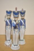 A group of three Lladro porcelain Cadet Soldier figures, comprising soldier with bugle, soldier with