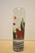 A John Ditchfielf iridescent clear art glass paperweight, of domed pillar form and decorated with
