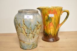 An Art Deco Bourne Denby Danesby Ware vase, glazed in pastel tones and measuring 18cm high, together