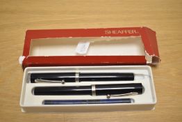 A Sheaffer No Nonsense cartridge fill fountain pen and roller ball set in black with chrome trim