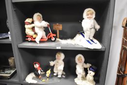 Four Ashton Drake Snow Baby porcelain headed collector's dolls, to comprise Snow Baby Express,